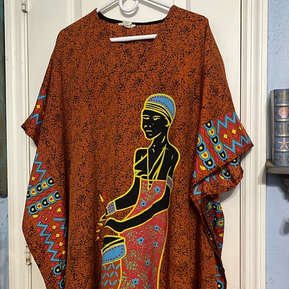 Gypsy Blu one size fits all. Burnt orange colored dress. NWOT